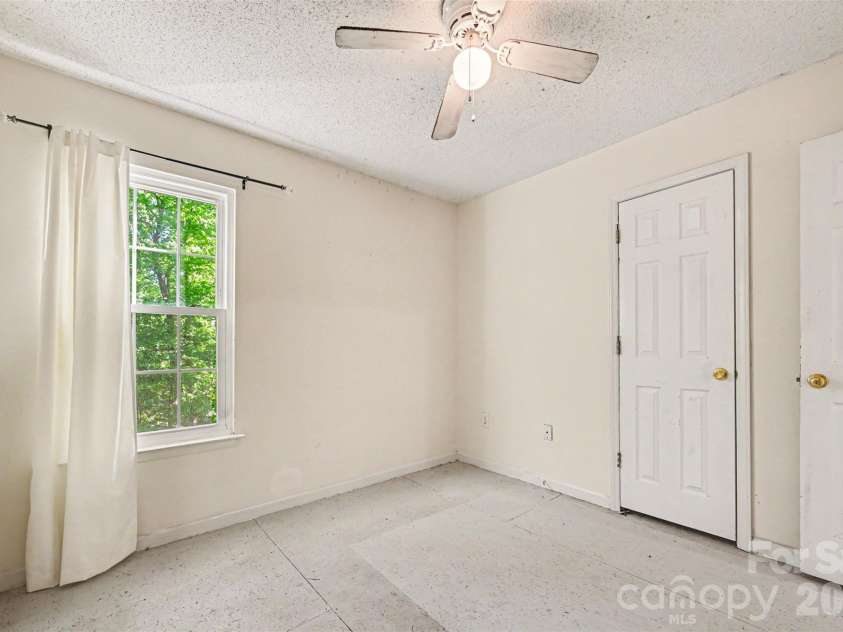 4718 Titus Court, Monroe, NC 28110.  MLS# CAR4373667, YatesRealty ID 17713. Upstairs bedroom