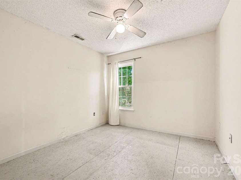4718 Titus Court, Monroe, NC 28110.  MLS# CAR4373667, YatesRealty ID 17713. Upstairs bedroom