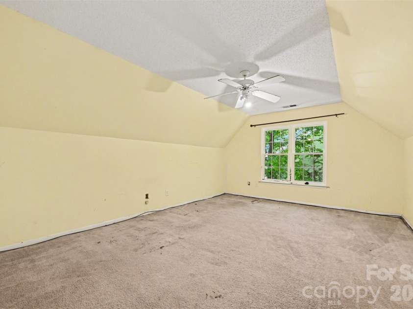 4718 Titus Court, Monroe, NC 28110.  MLS# CAR4373667, YatesRealty ID 17713. Upstairs bedroom
