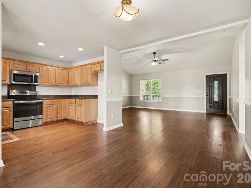 12820 Big Lick Road, Oakboro, NC 28129.  MLS# CAR4374025, YatesRealty ID 17714. Kitchen and living room
