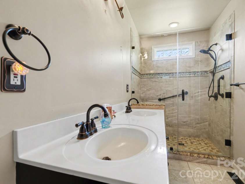 12820 Big Lick Road, Oakboro, NC 28129.  MLS# CAR4374025, YatesRealty ID 17714. Primary ensuite bathroom