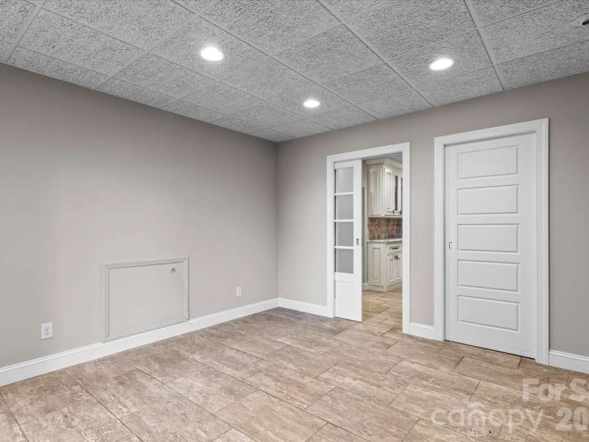 198 Broadbill Drive, Mooresville, NC 28117.  MLS# CAR4368023, YatesRealty ID 17715. Basement Flex Space or Office