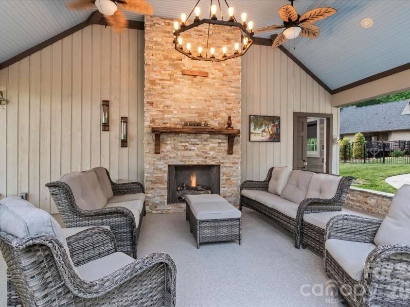 198 Broadbill Drive, Mooresville, NC 28117.  MLS# CAR4368023, YatesRealty ID 17715. Pool Cabana with Fireplace, Full Bath and Storage