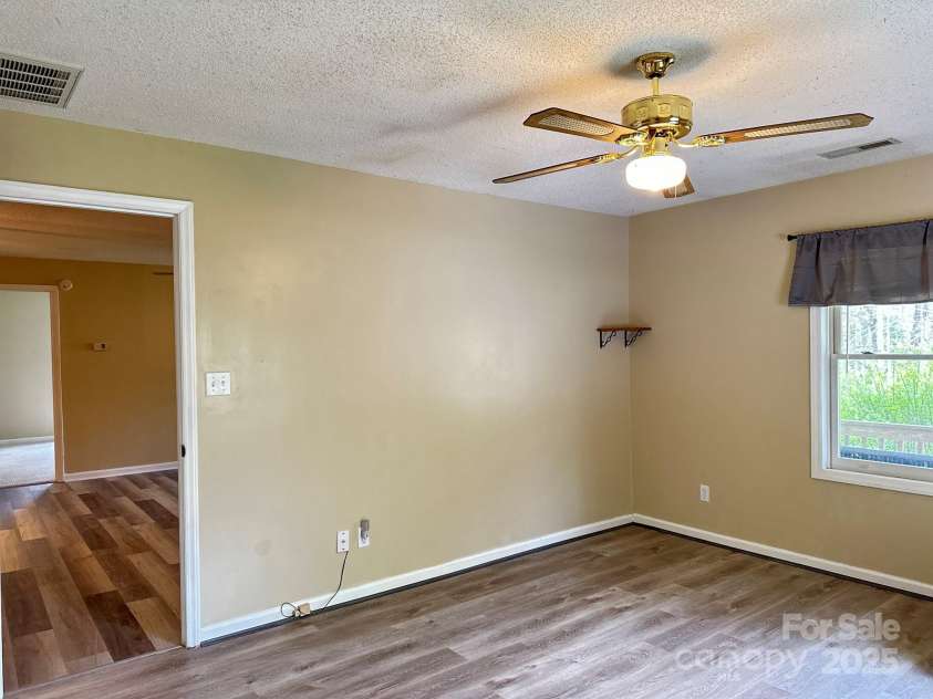 414 Hickory Cove Road, Bryson City, NC 28713.  MLS# CAR4243476, YatesRealty ID 17715. Primary bedroom