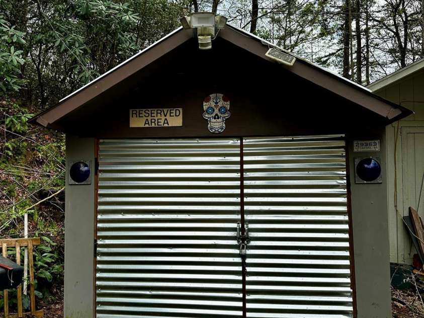 414 Hickory Cove Road, Bryson City, NC 28713.  MLS# CAR4243476, YatesRealty ID 17715. Storage shed