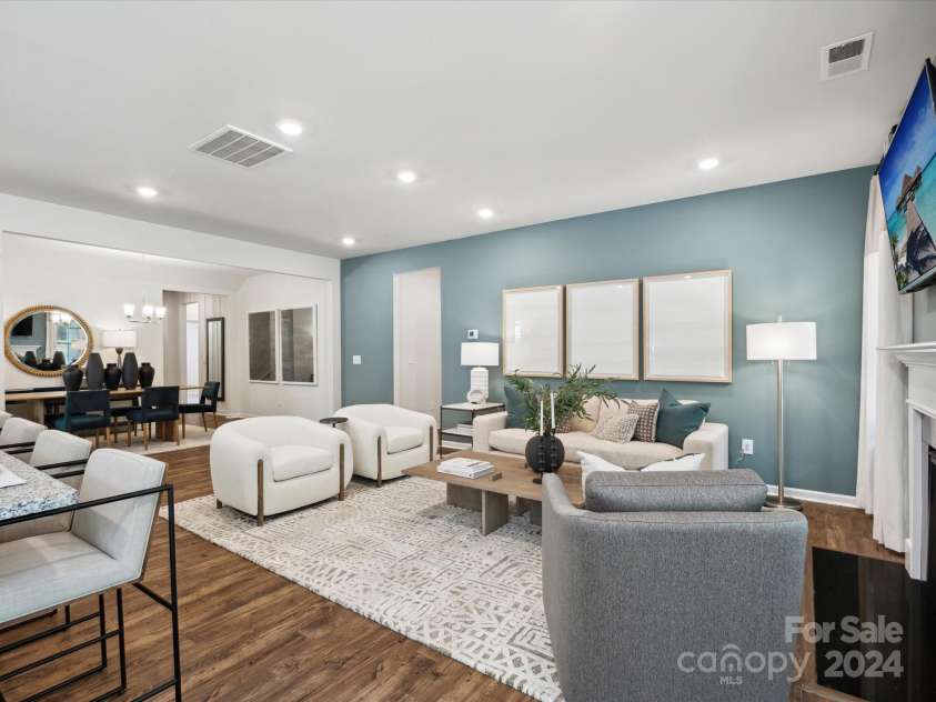 1053 Bull Dog Lane, Wingate, NC 28174.  MLS# CAR4192555, YatesRealty ID 17718. Representational photo of Model Family Room