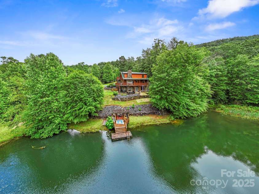 111 Grizzly Den Way, Marion, NC 28752.  MLS# CAR4262742, YatesRealty ID 17719. The pond