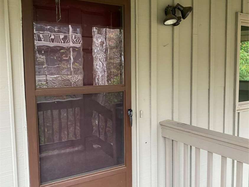 11 Cedarbrook Drive, Laurel Park, NC 28739.  MLS# CAR4211239, YatesRealty ID 1773. Front Door
