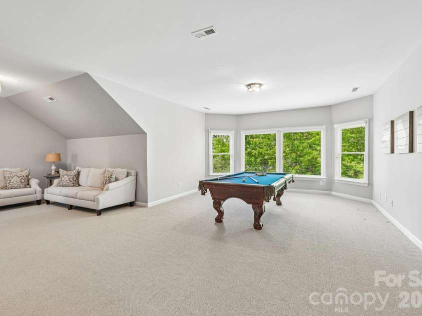 29023 Villa View Court, Fort Mill, SC 29707.  MLS# CAR4372357, YatesRealty ID 17732. 3rd floor rec room 