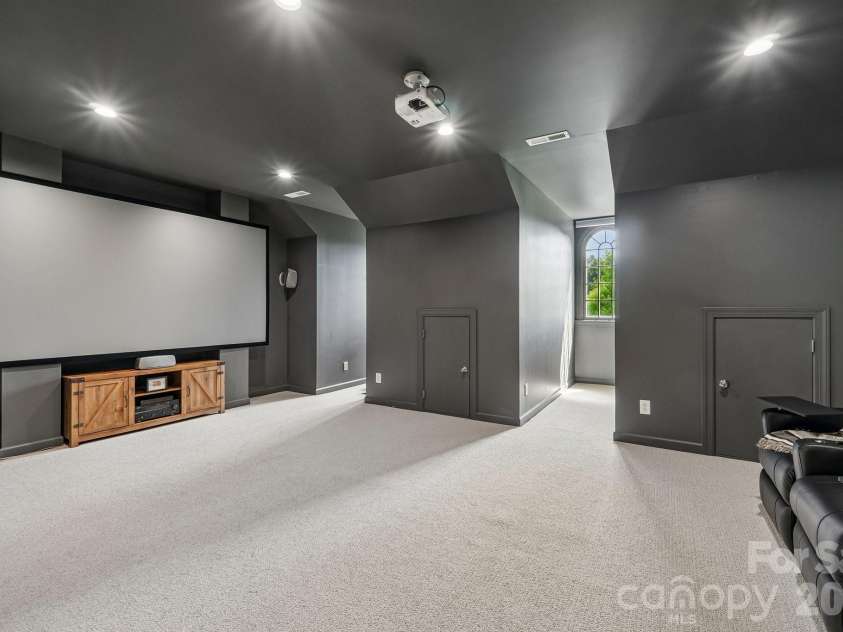 29023 Villa View Court, Fort Mill, SC 29707.  MLS# CAR4372357, YatesRealty ID 17732. 3rd floor theater room
