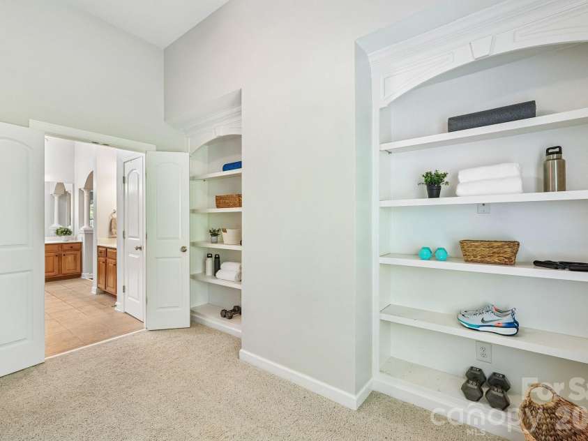 29023 Villa View Court, Fort Mill, SC 29707.  MLS# CAR4372357, YatesRealty ID 17732. Flex space features built-in shelving
