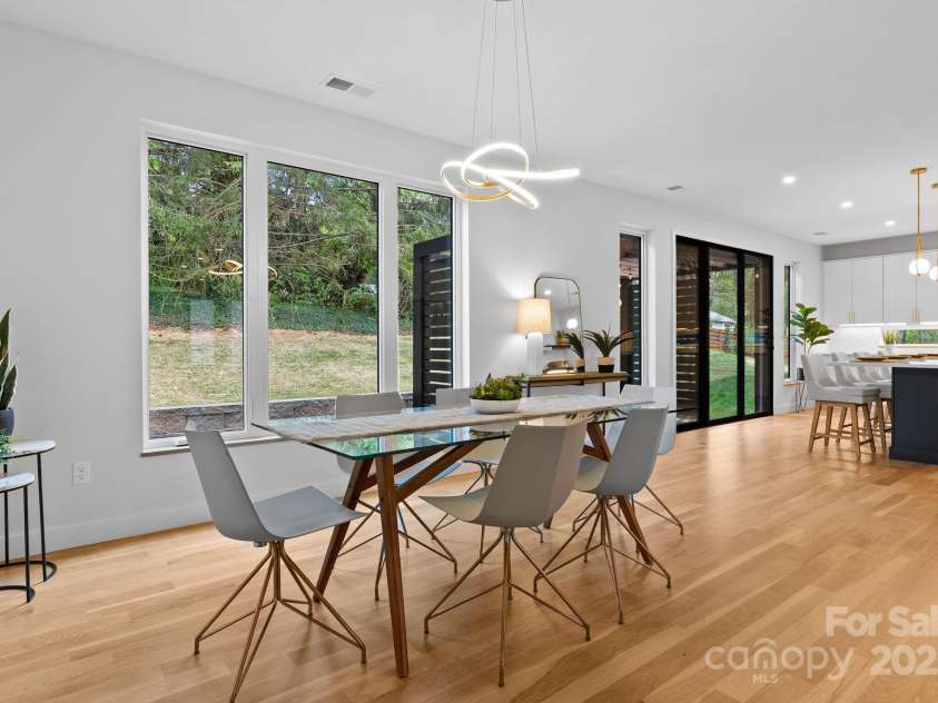 520 Tenth Street, Black Mountain, NC 28711.  MLS# CAR4247176, YatesRealty ID 17733. Dining Opens to Eat-in Kitchen