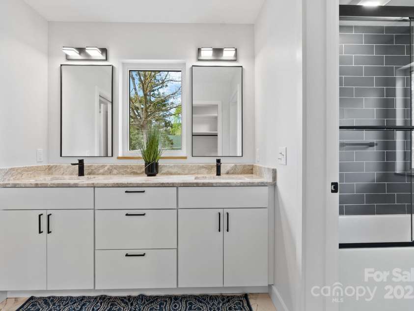 520 Tenth Street, Black Mountain, NC 28711.  MLS# CAR4247176, YatesRealty ID 17733. Double Sink Vanity * Shower/ Tub