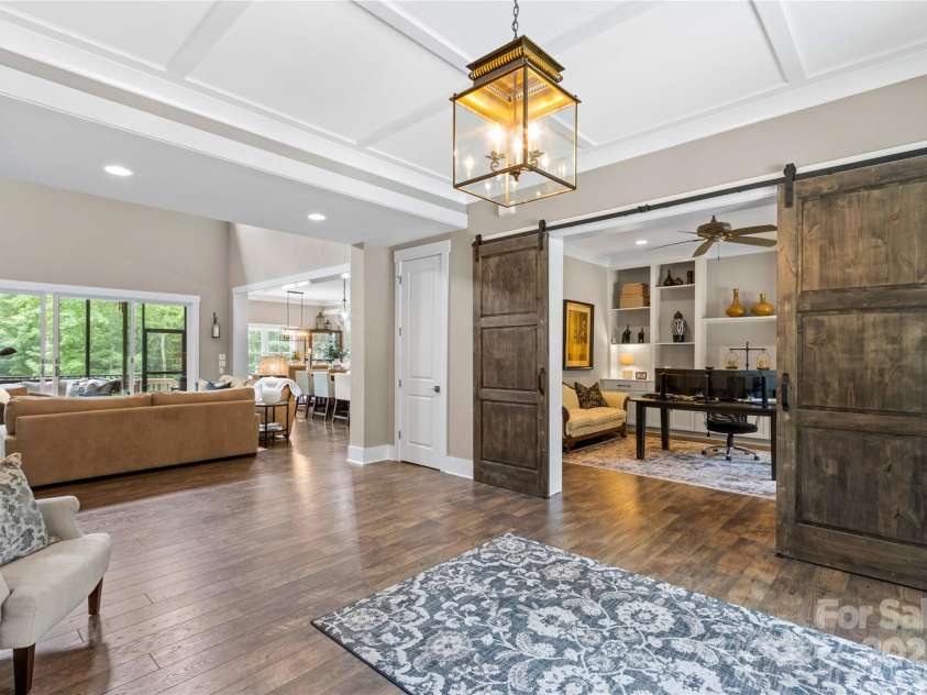 127 Tradition Lane, Mooresville, NC 28115.  MLS# CAR4165702, YatesRealty ID 17737. Barn Doors lead to Office