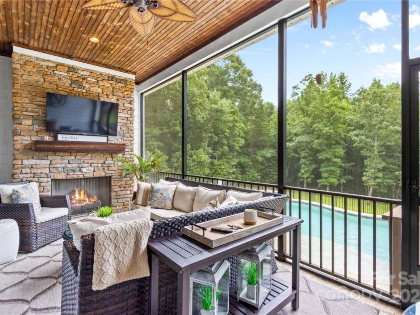 127 Tradition Lane, Mooresville, NC 28115.  MLS# CAR4165702, YatesRealty ID 17737. Covered Terrace Porch with Fireplace