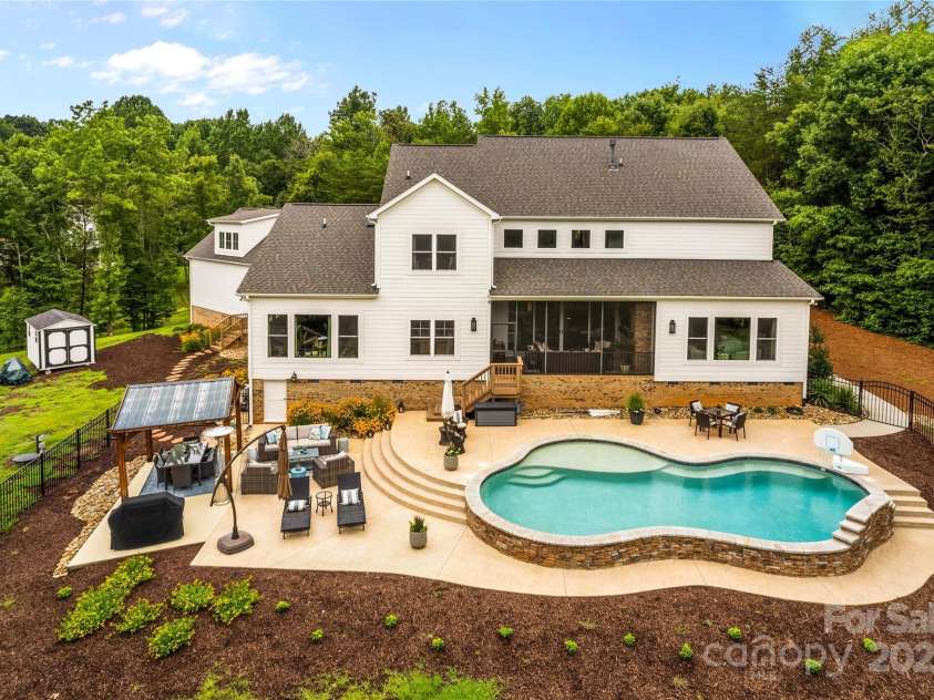 127 Tradition Lane, Mooresville, NC 28115.  MLS# CAR4165702, YatesRealty ID 17737. Enjoy Summer here on your Private Acreage! 127 Tradition Lane, Mooresville