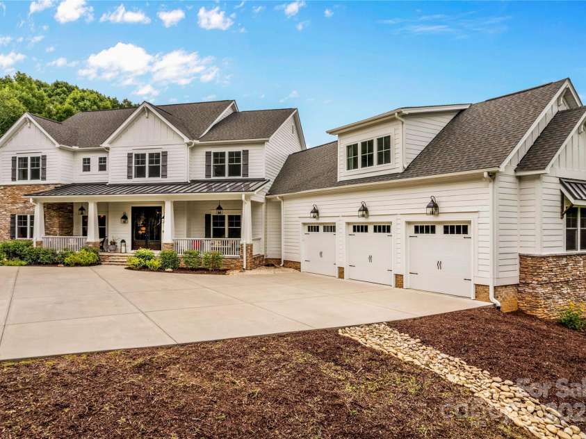 127 Tradition Lane, Mooresville, NC 28115.  MLS# CAR4165702, YatesRealty ID 17737. Large Front Porch, Three Car Garage