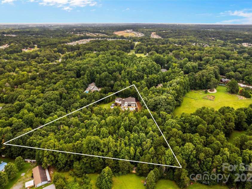 127 Tradition Lane, Mooresville, NC 28115.  MLS# CAR4165702, YatesRealty ID 17737. Over 4 Acres for Privacy