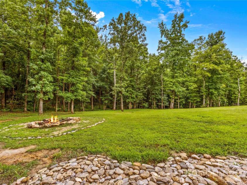 127 Tradition Lane, Mooresville, NC 28115.  MLS# CAR4165702, YatesRealty ID 17737. Riverstone landscape