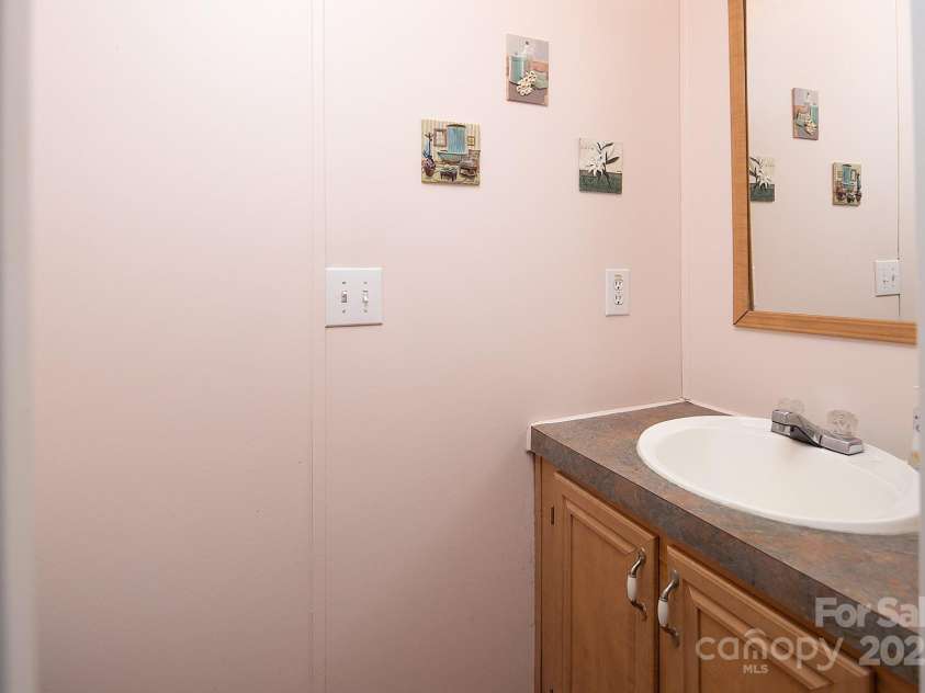 115 Tradewinds Court, Mooresville, NC 28115.  MLS# CAR4215397, YatesRealty ID 1774. Guest half bath