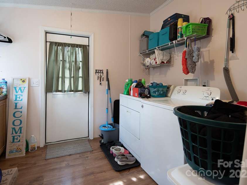 115 Tradewinds Court, Mooresville, NC 28115.  MLS# CAR4215397, YatesRealty ID 1774. Laundry area with utility sink.