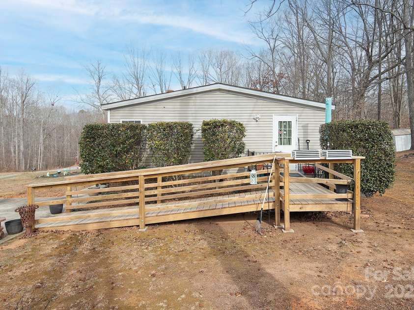 115 Tradewinds Court, Mooresville, NC 28115.  MLS# CAR4215397, YatesRealty ID 1774. Side entrance with ramp.