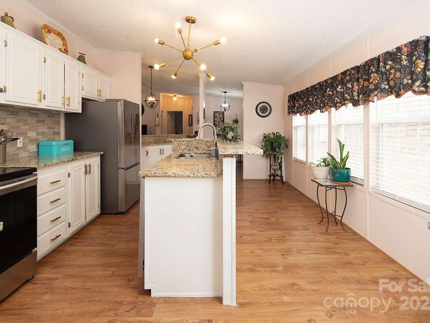 115 Tradewinds Court, Mooresville, NC 28115.  MLS# CAR4215397, YatesRealty ID 1774. Tons of counter and storage space in the kitchen.