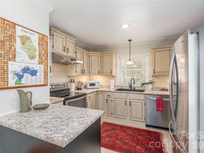 102 Fall Creek Road, Waynesville, NC 28785.  MLS# CAR4368876, YatesRealty ID 17746. 