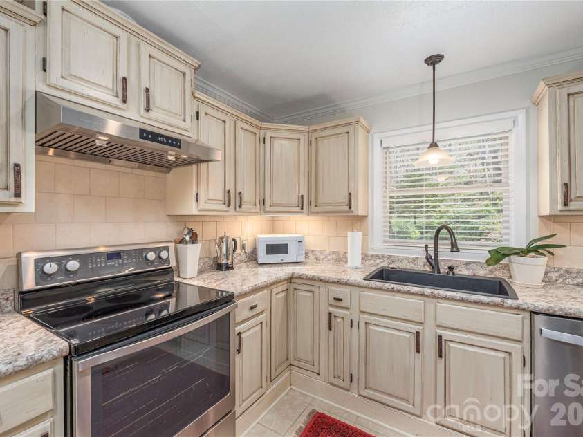102 Fall Creek Road, Waynesville, NC 28785.  MLS# CAR4368876, YatesRealty ID 17746. 