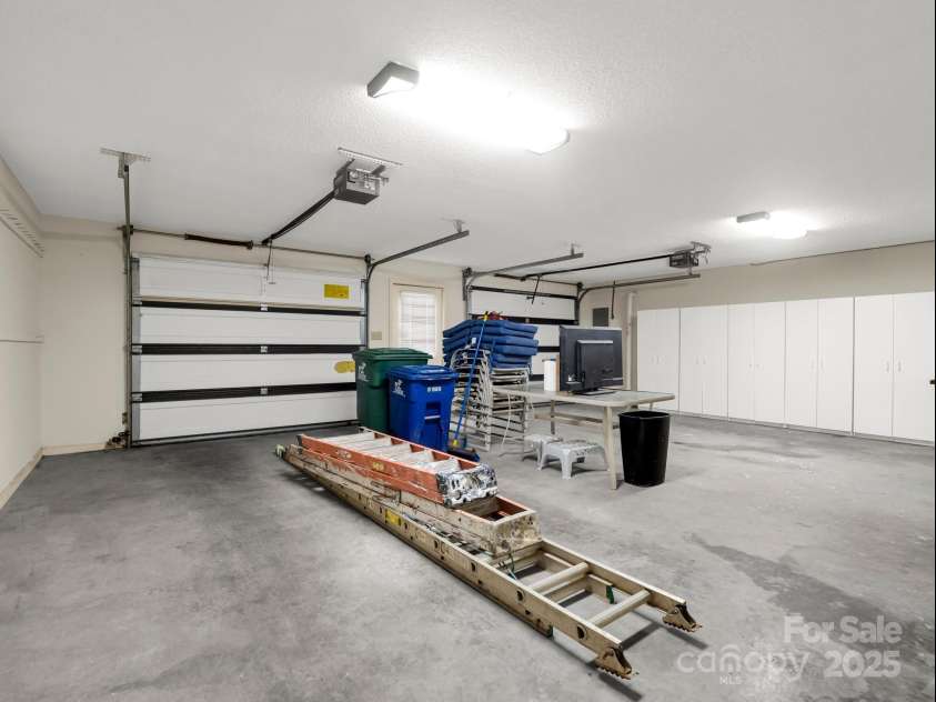 1116 High Vista Drive, Mills River, NC 28759.  MLS# CAR4227946, YatesRealty ID 17746. 2 Car Garage w/Storage Cabinets.