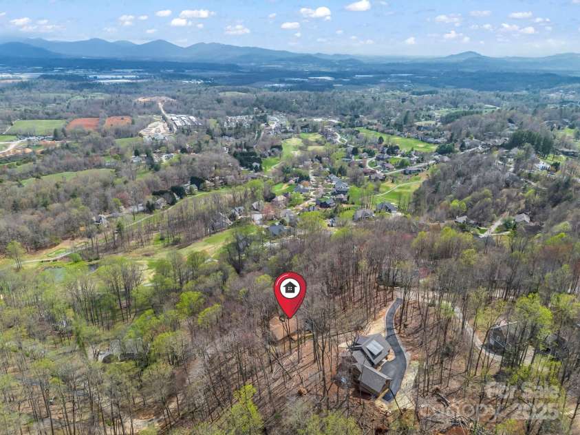 1116 High Vista Drive, Mills River, NC 28759.  MLS# CAR4227946, YatesRealty ID 17746. Aerial Photo with Chestnut Mountain Golf Course in Background
