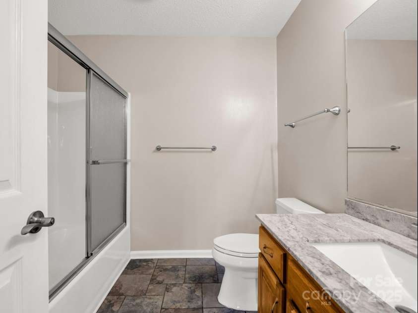 1116 High Vista Drive, Mills River, NC 28759.  MLS# CAR4227946, YatesRealty ID 17746. Full Bath in Basement Level