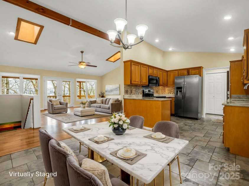 1116 High Vista Drive, Mills River, NC 28759.  MLS# CAR4227946, YatesRealty ID 17746. Living Room & Dining Area Main Level Virtually Staged