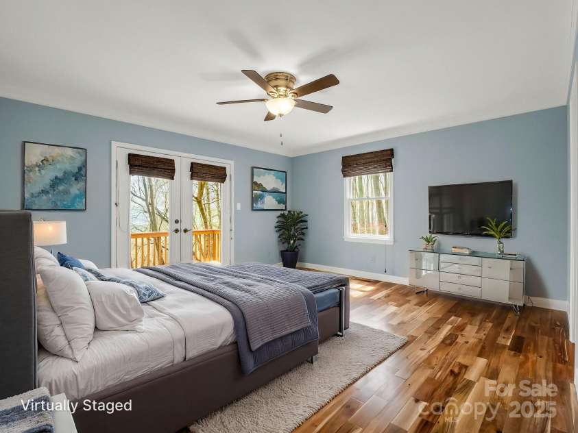1116 High Vista Drive, Mills River, NC 28759.  MLS# CAR4227946, YatesRealty ID 17746. Primary Bedroom w/deck access Virtually Staged