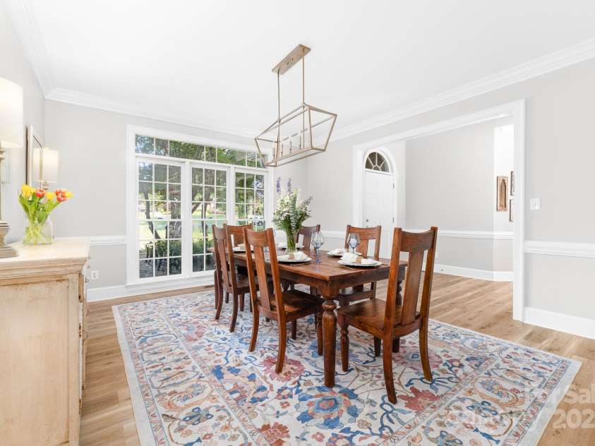 1115 Maremont Court, Matthews, NC 28104.  MLS# CAR4265008, YatesRealty ID 17750. Dining room that can accommodate a table that seats 8 - 12.