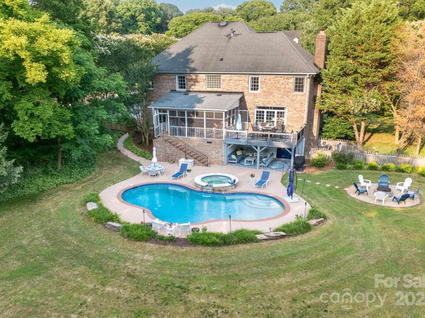 1115 Maremont Court, Matthews, NC 28104.  MLS# CAR4265008, YatesRealty ID 17750. Everything you need is in this backyard to relax or entertain.