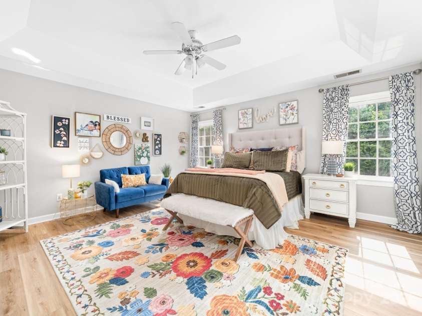 1115 Maremont Court, Matthews, NC 28104.  MLS# CAR4265008, YatesRealty ID 17750. Primary bedroom large enough to accommodate bedroom furniture and a seating area