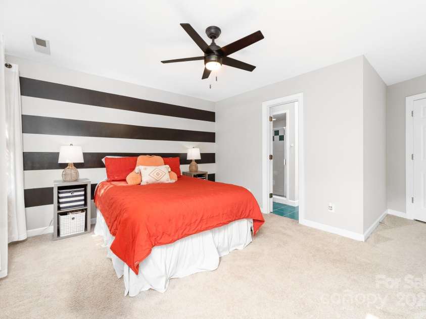 1115 Maremont Court, Matthews, NC 28104.  MLS# CAR4265008, YatesRealty ID 17750. Secondary bedroom with en suite bathroom.