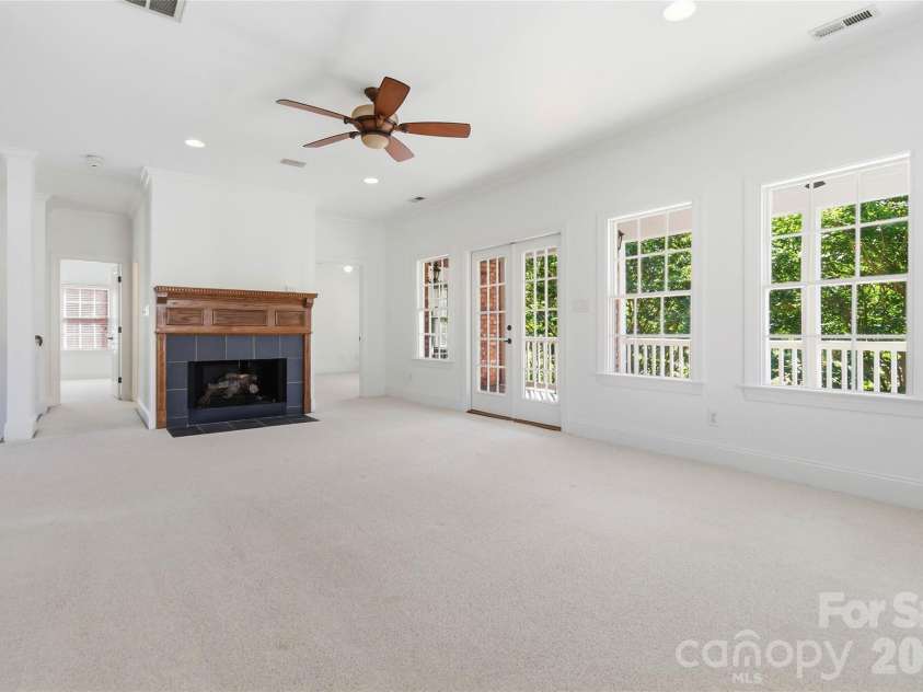 5613 Fairway View Drive, Charlotte, NC 28277.  MLS# CAR4372831, YatesRealty ID 17752. Den with access to Upper Level Veranda