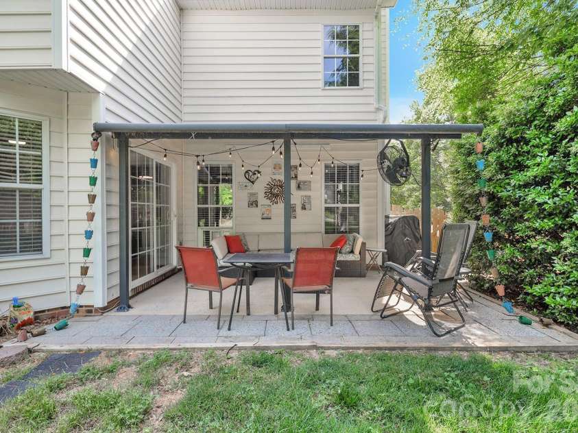 10311 Suffield Court, Charlotte, NC 28269.  MLS# CAR4375671, YatesRealty ID 17757. Backyard Covered Patio