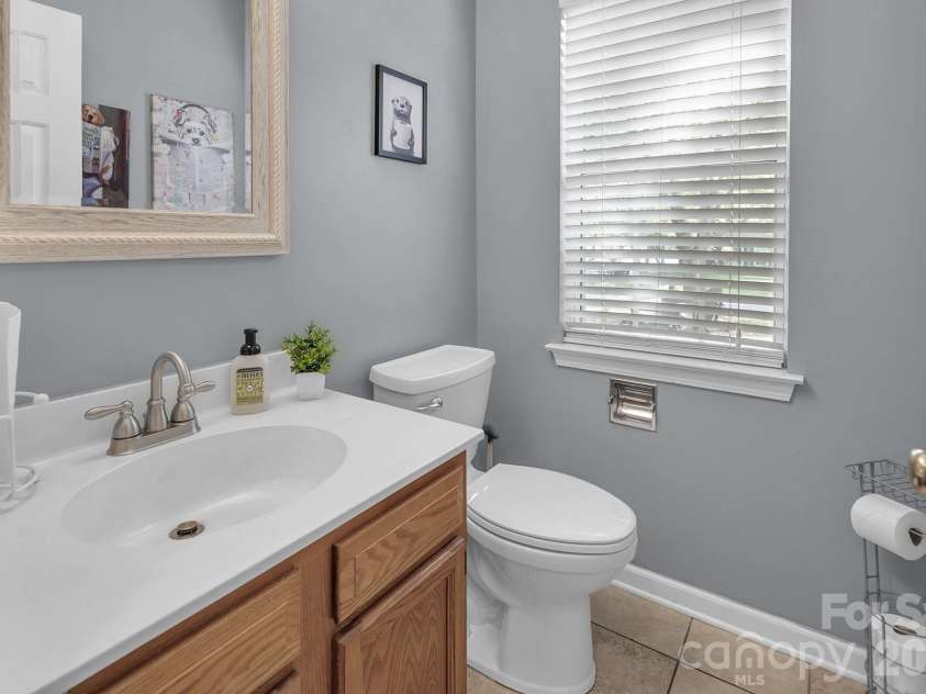 10311 Suffield Court, Charlotte, NC 28269.  MLS# CAR4375671, YatesRealty ID 17757. Half Bath on the Main