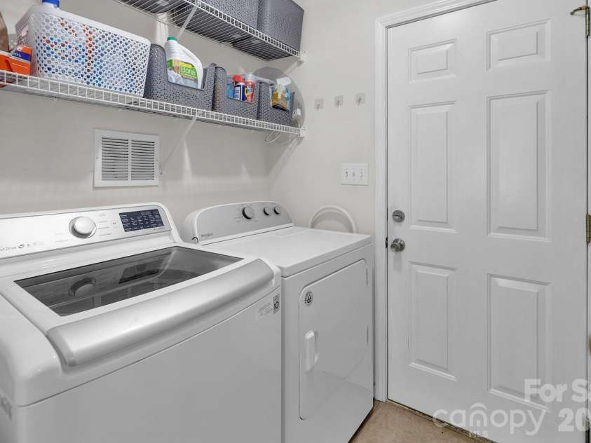 10311 Suffield Court, Charlotte, NC 28269.  MLS# CAR4375671, YatesRealty ID 17757. Laundry Room on the Main