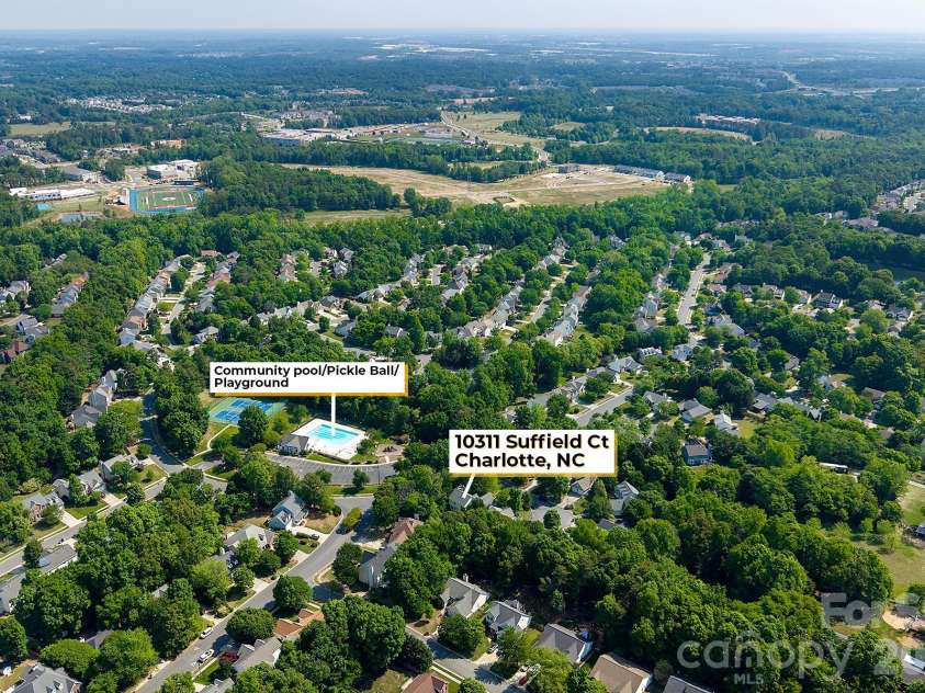 10311 Suffield Court, Charlotte, NC 28269.  MLS# CAR4375671, YatesRealty ID 17757. Mature Tree Filled Community