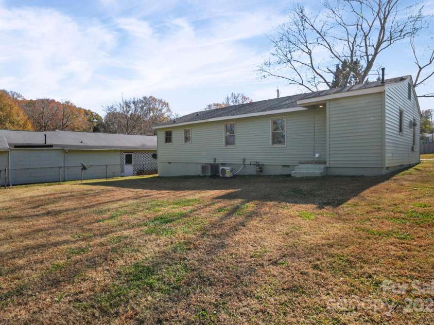 1106 Summer Drive, Gastonia, NC 28052.  MLS# CAR4324502, YatesRealty ID 17760. Backyard- shared 