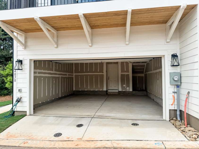 14038 Felix Lane, Charlotte, NC 28277.  MLS# CAR4243570, YatesRealty ID 17765. 2-car garage with opener and E charger