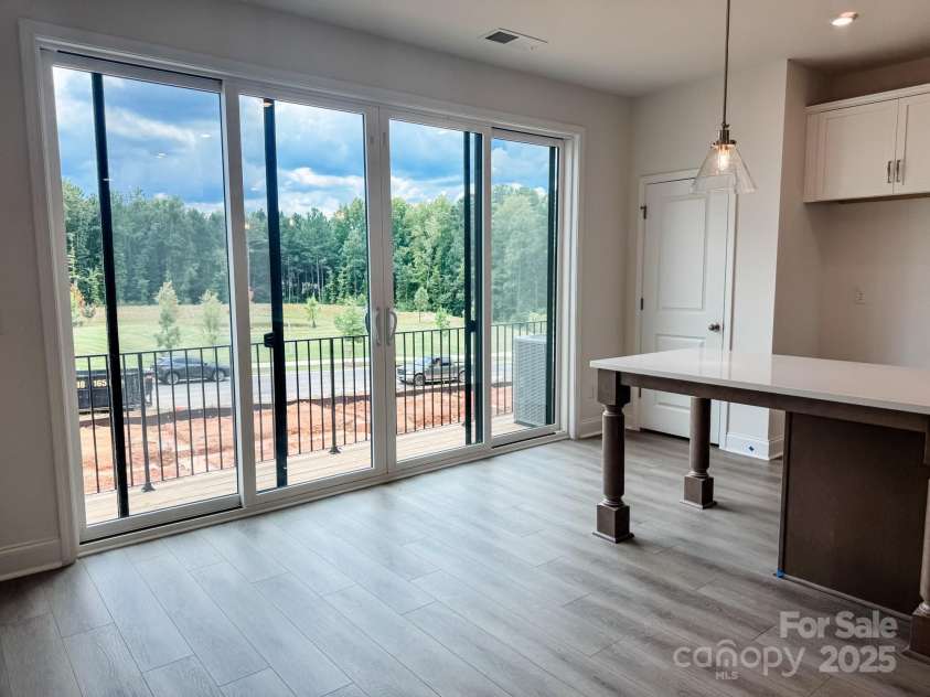 14038 Felix Lane, Charlotte, NC 28277.  MLS# CAR4243570, YatesRealty ID 17765. Double Slider Doors out to the balcony