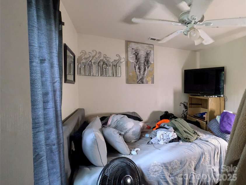 3241 Reid Avenue, Charlotte, NC 28208.  MLS# CAR4267899, YatesRealty ID 17768. Upstairs Bedroom