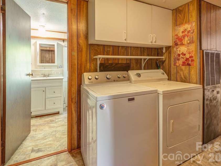 64 Haw Creek Circle, Asheville, NC 28805.  MLS# CAR4365839, YatesRealty ID 17770. Hall Laundry, W+D convey!