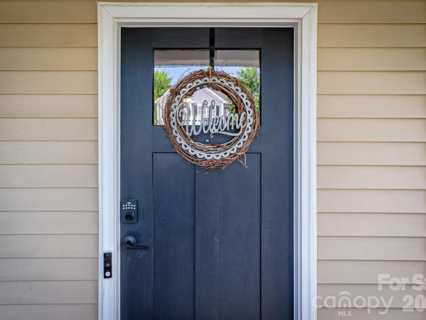 10809 Traders Court, Davidson, NC 28036.  MLS# CAR4376076, YatesRealty ID 17775. Front Door