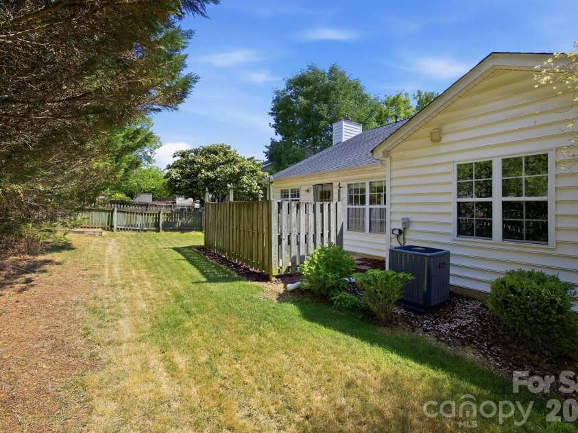 8616 Mineral Ridge Way, Charlotte, NC 28269.  MLS# CAR4377358, YatesRealty ID 17788. Backyard